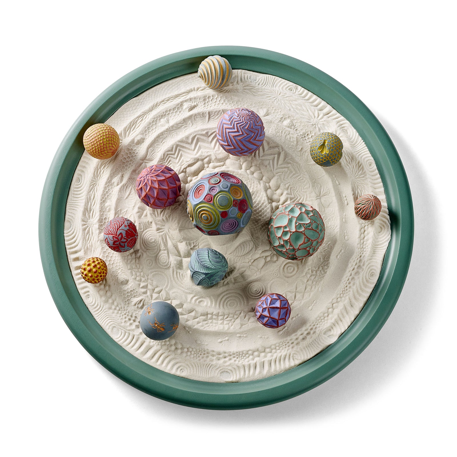 A handcrafted Olander Wonderscape with patterned sand