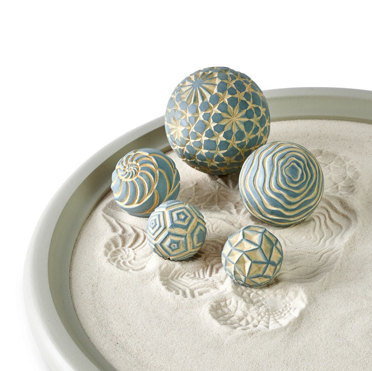 close-up of handmade sand spheres in mystical desert colors