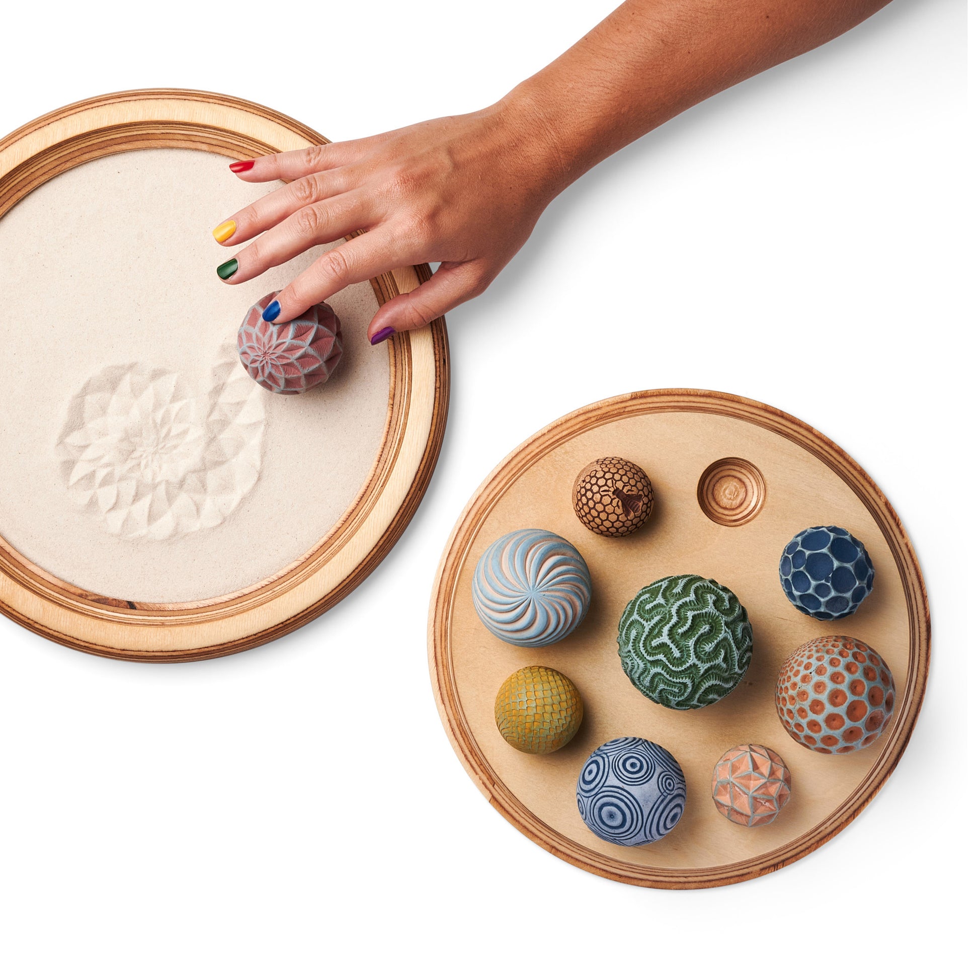 12 inch wonderscape cover in natural with sand spheres in play to demonstrate use