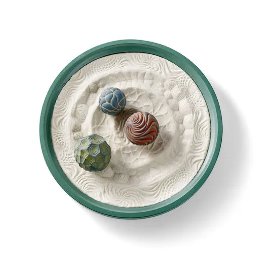 Island Time, an 8-inch Wonderscape in the Tropical collection, from above: a teal tray of sand with patterned Sand Spheres.